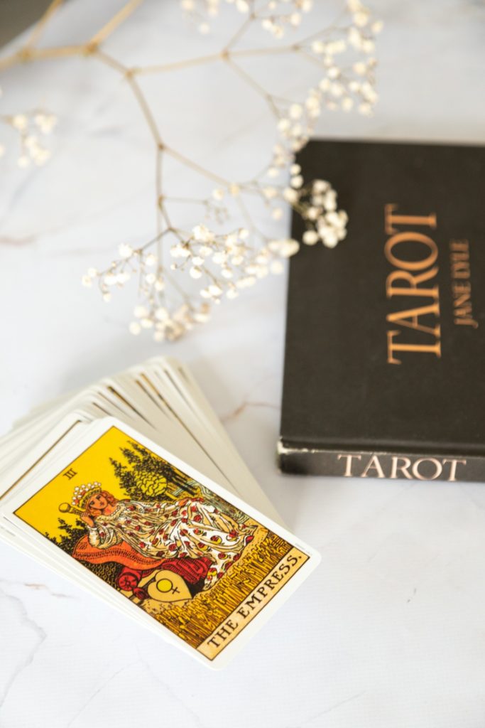 Cards of tarot and book to play at tarot game
