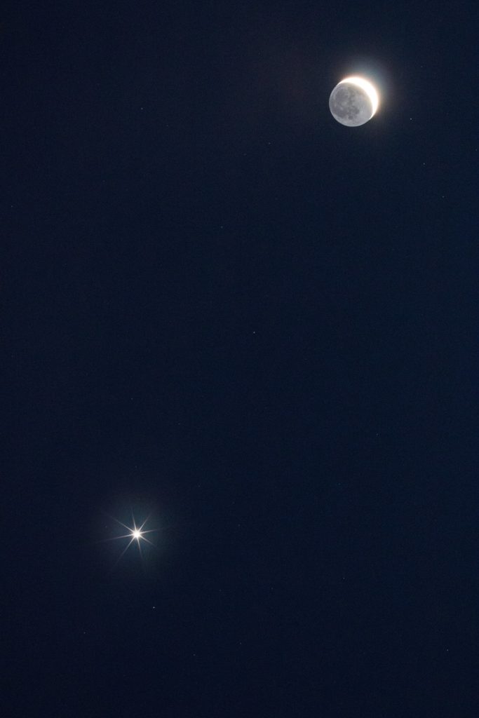 the moon and Venus in the sky
