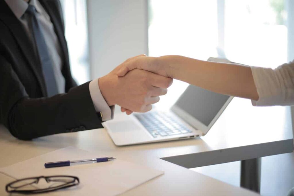 accepting a new job offer with a handshake