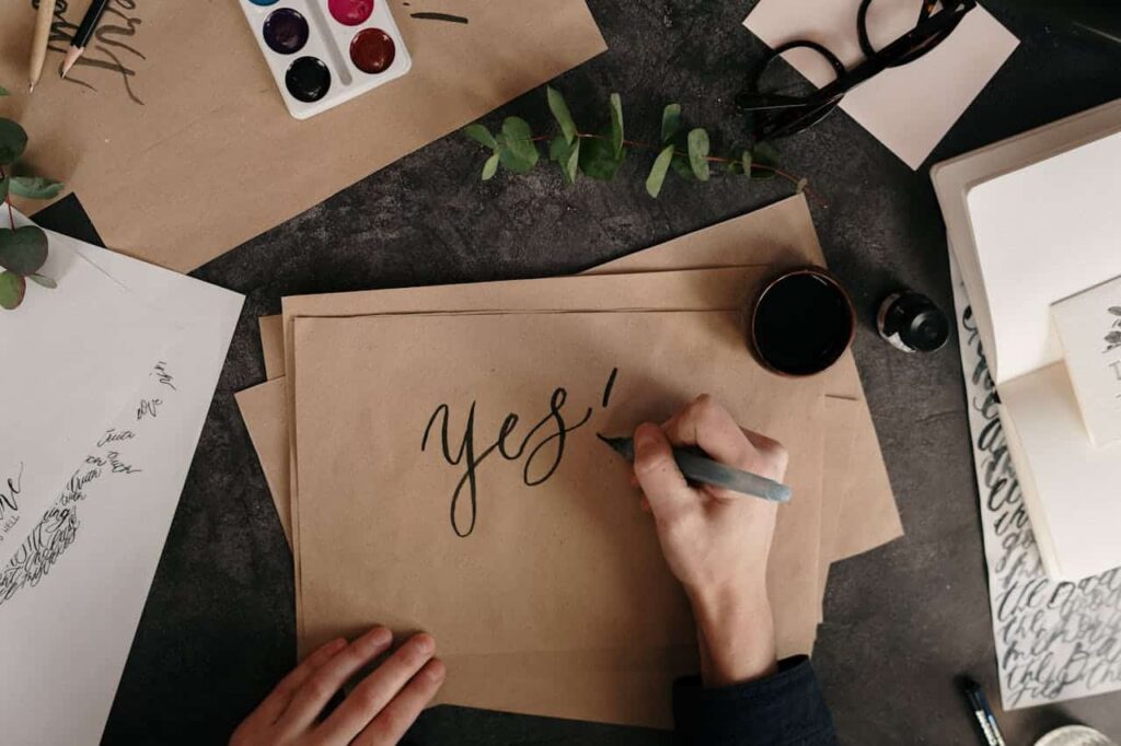 brown paper with 'yes' written on it