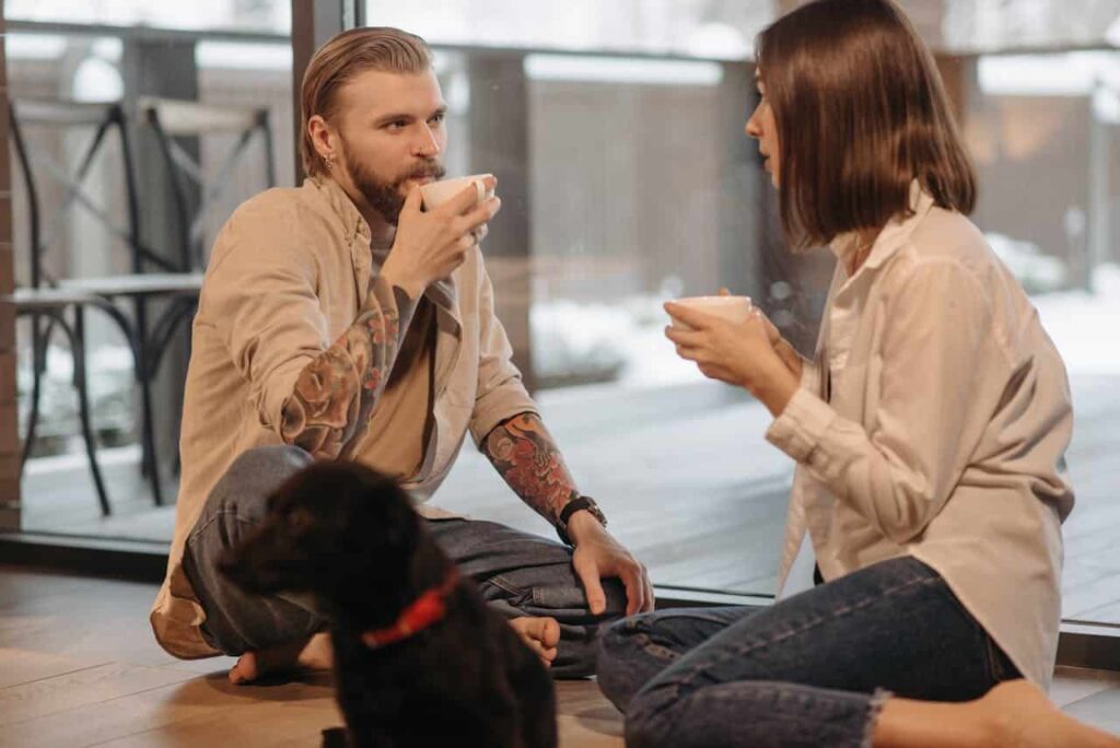 couple drinking coffee and having a conversation