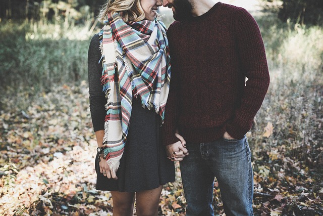 couple holding hands together