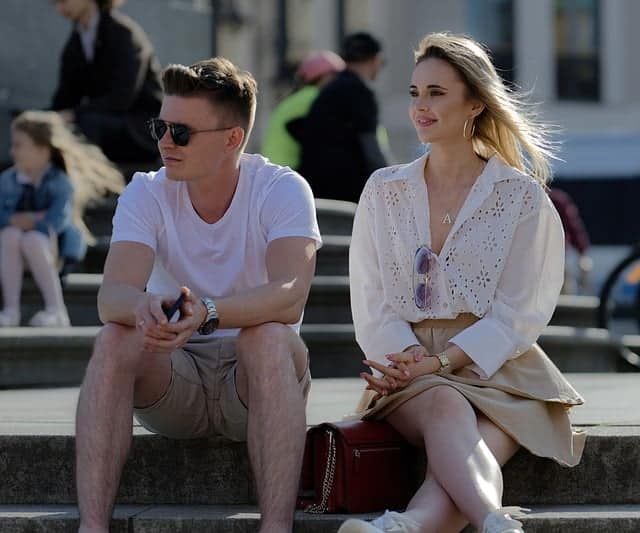 couple sitting at stairs