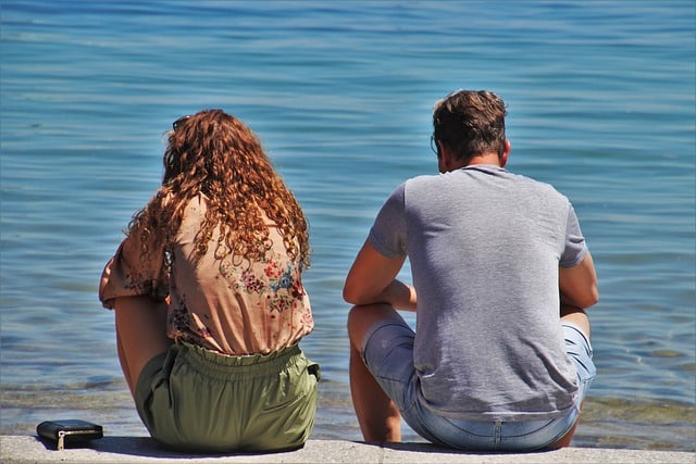 Couple talking at the beach