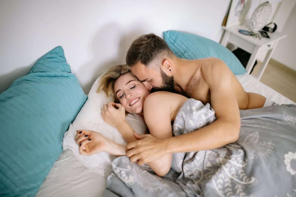 couple together in bed