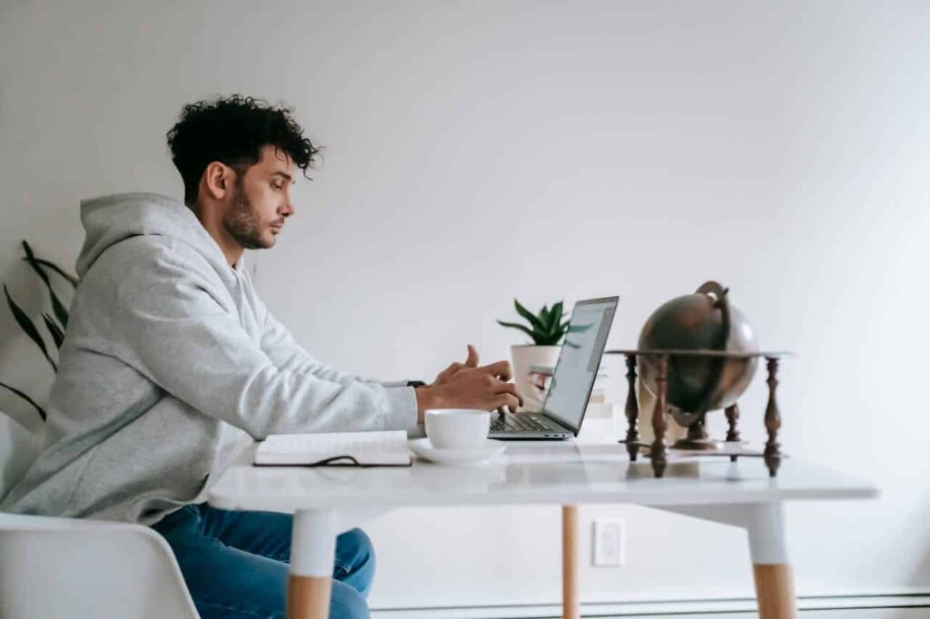 hardworking employee is working on the laptop