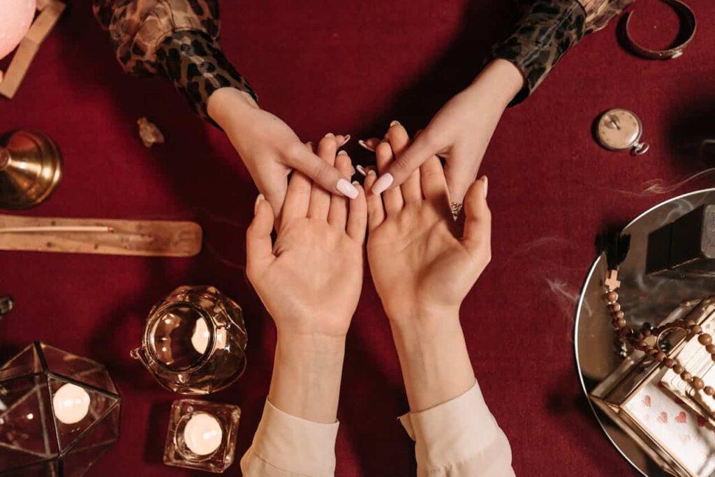 high angle photo of two persons hands
