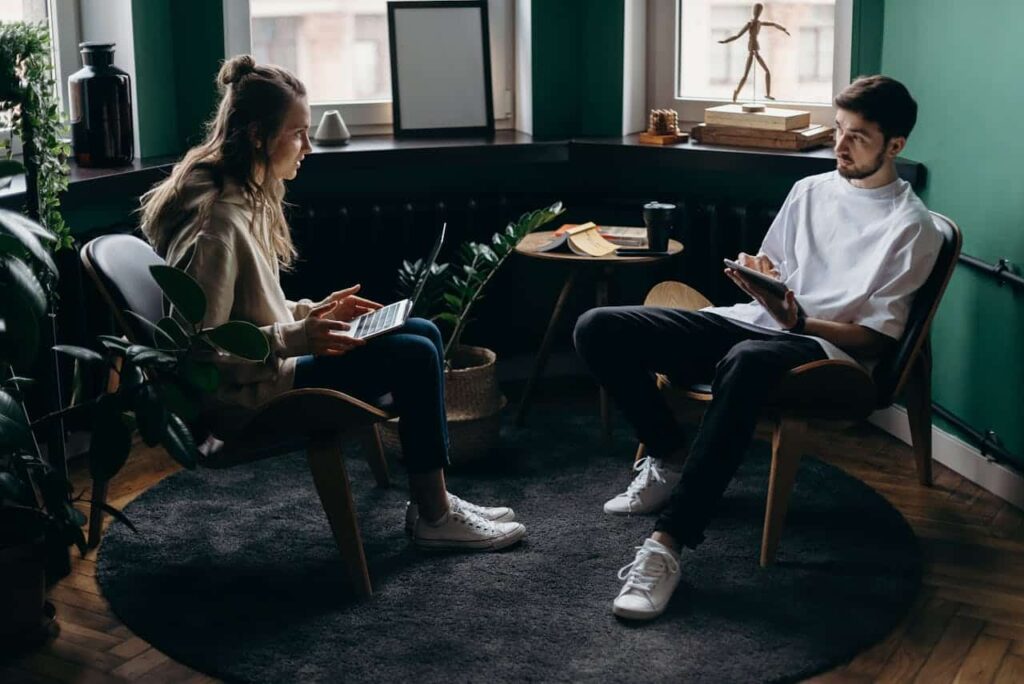 man and woman talking to each other