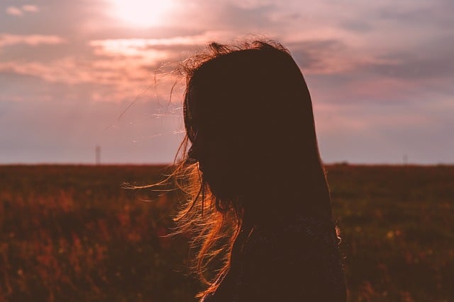 woman in nature thinking