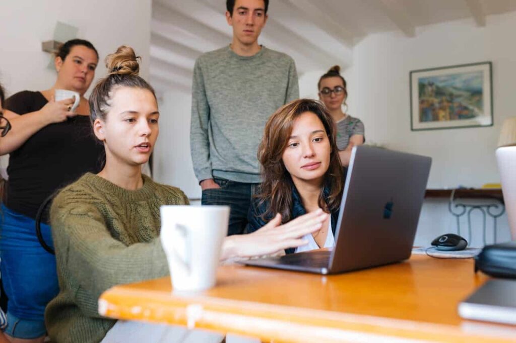 young woman discussing with her group