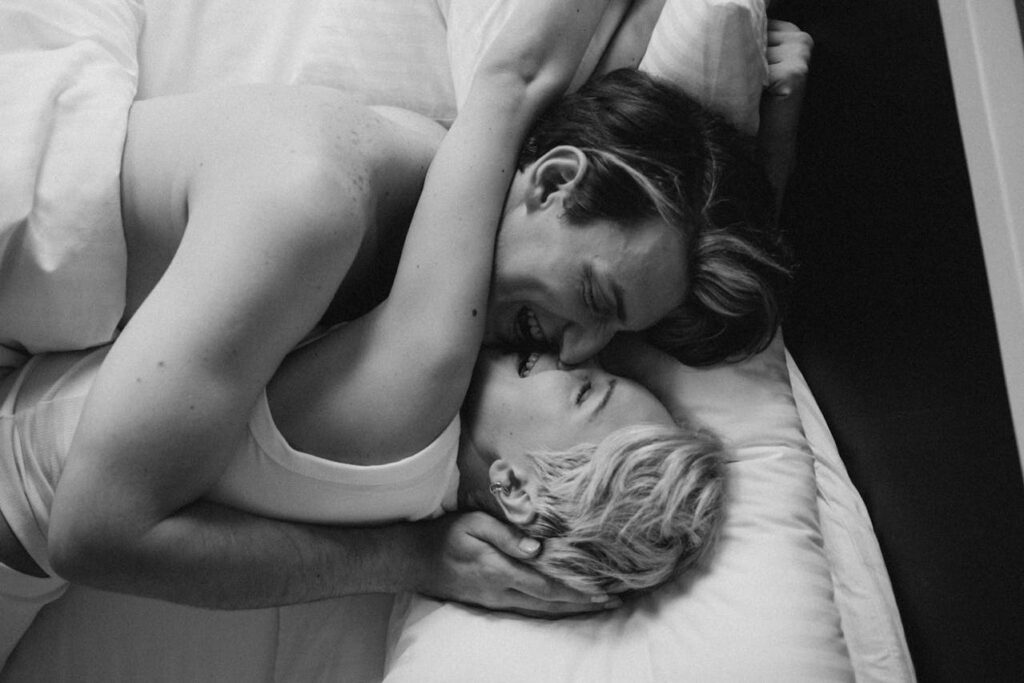 couple lying on bed