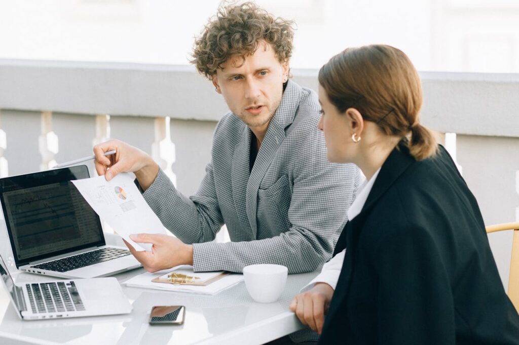 man and woman possibly discussing or working on a project