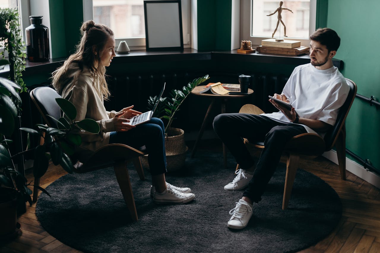 man and woman talking to each other