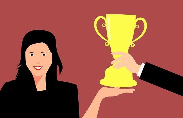 woman receiving award