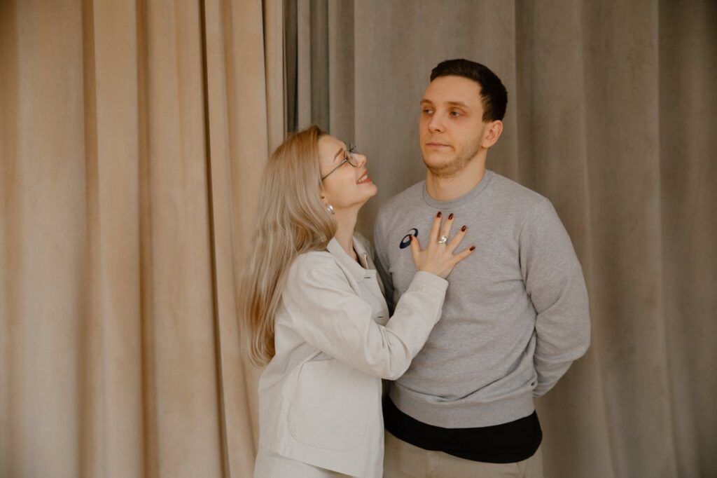 woman comforting her male friend