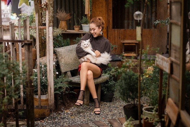 a woman showing a gentle and caring bond with a cat