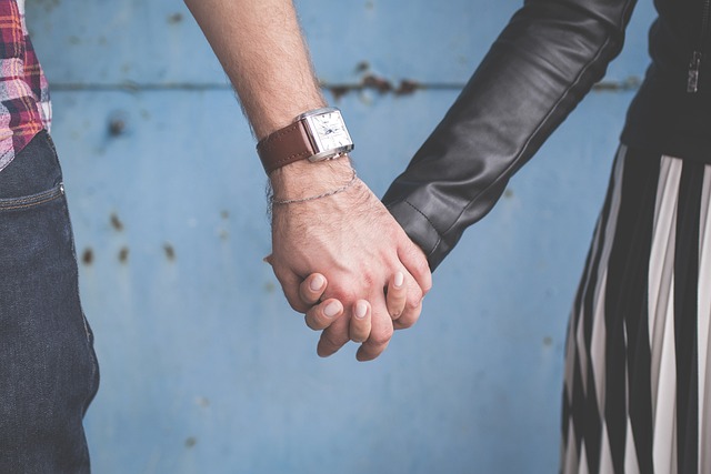 couple holding hands - emotional dependency