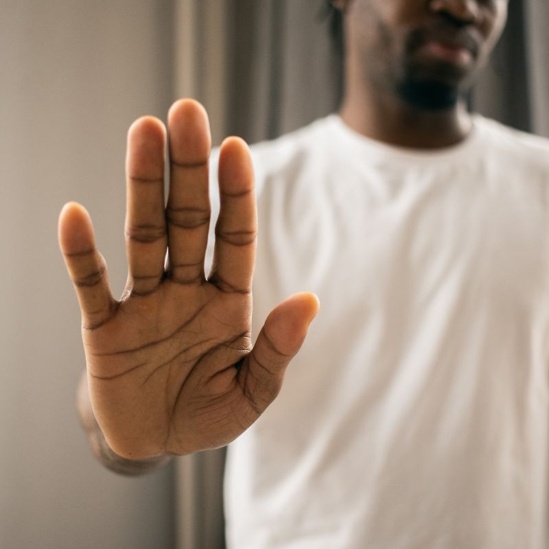 man showing stop gesture