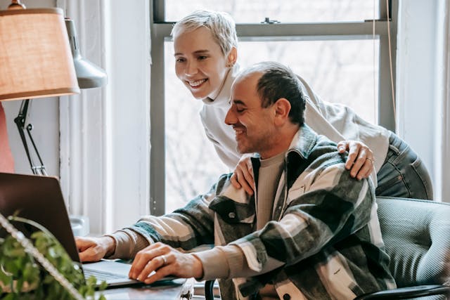 wife enthusiastically supporting her husband's creative ideas
