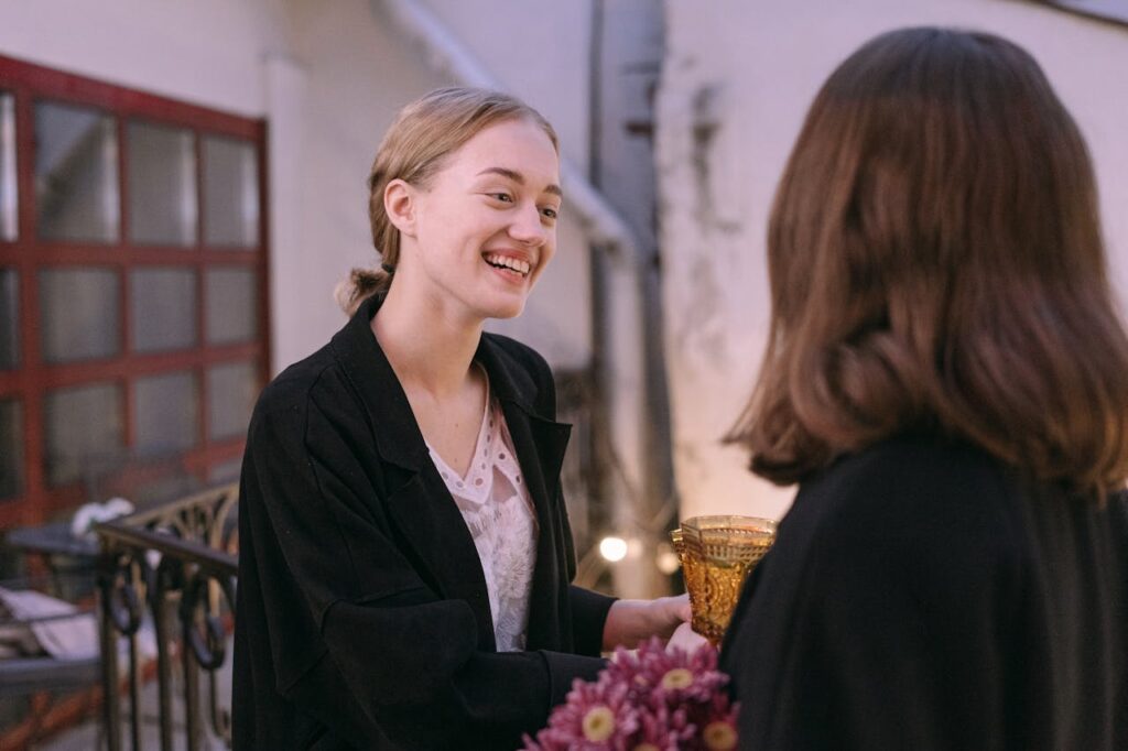 a woman smiling at a restaurant