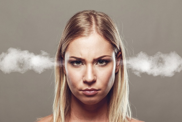 an angry expression on a woman's face