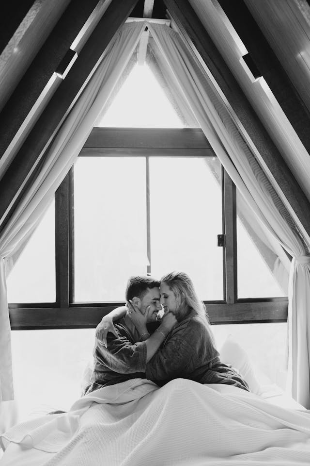 couple hugging in bed