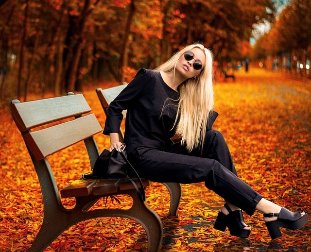 a classy woman wearing an all-black outfit