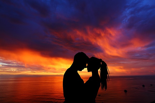 a couple sharing a romantic moment at sunset