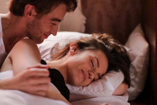 couple lying on bed