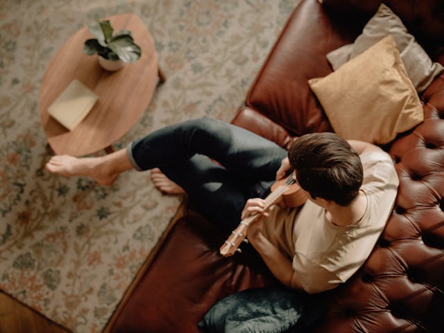 man enjoying his hobby at home