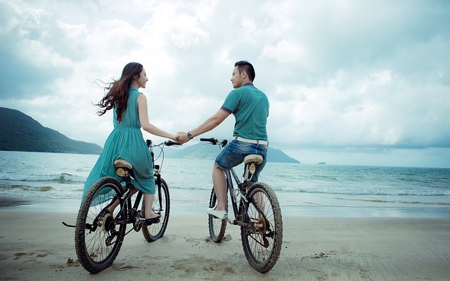 a couple biking together