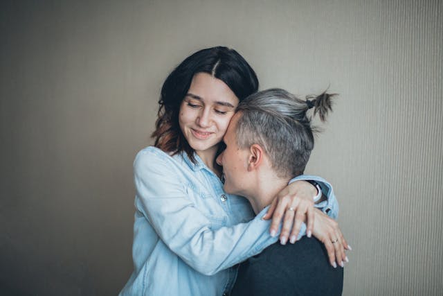a woman hugging her man, being his safe place