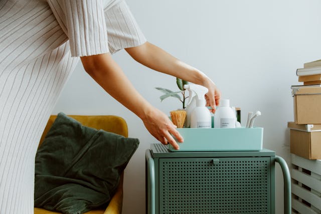 a woman organizing her self-care products