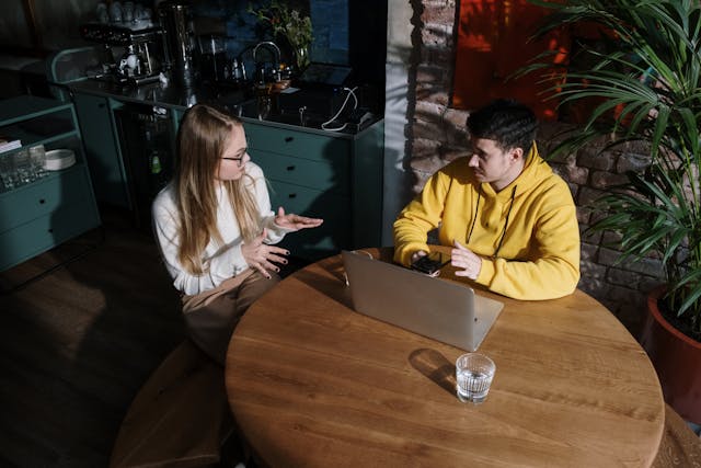 man and woman having a conversation